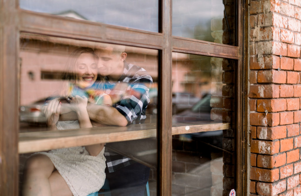 Tap & Bottle first date location. Engagement photo by Amber Lea Photography.